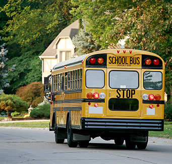 School bus driving down the street