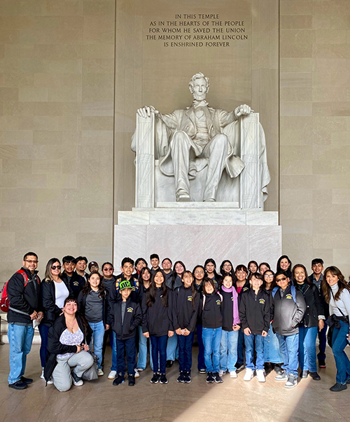 Superintendent Herrera visiting the Lincoln Memorial with group of students and teachers